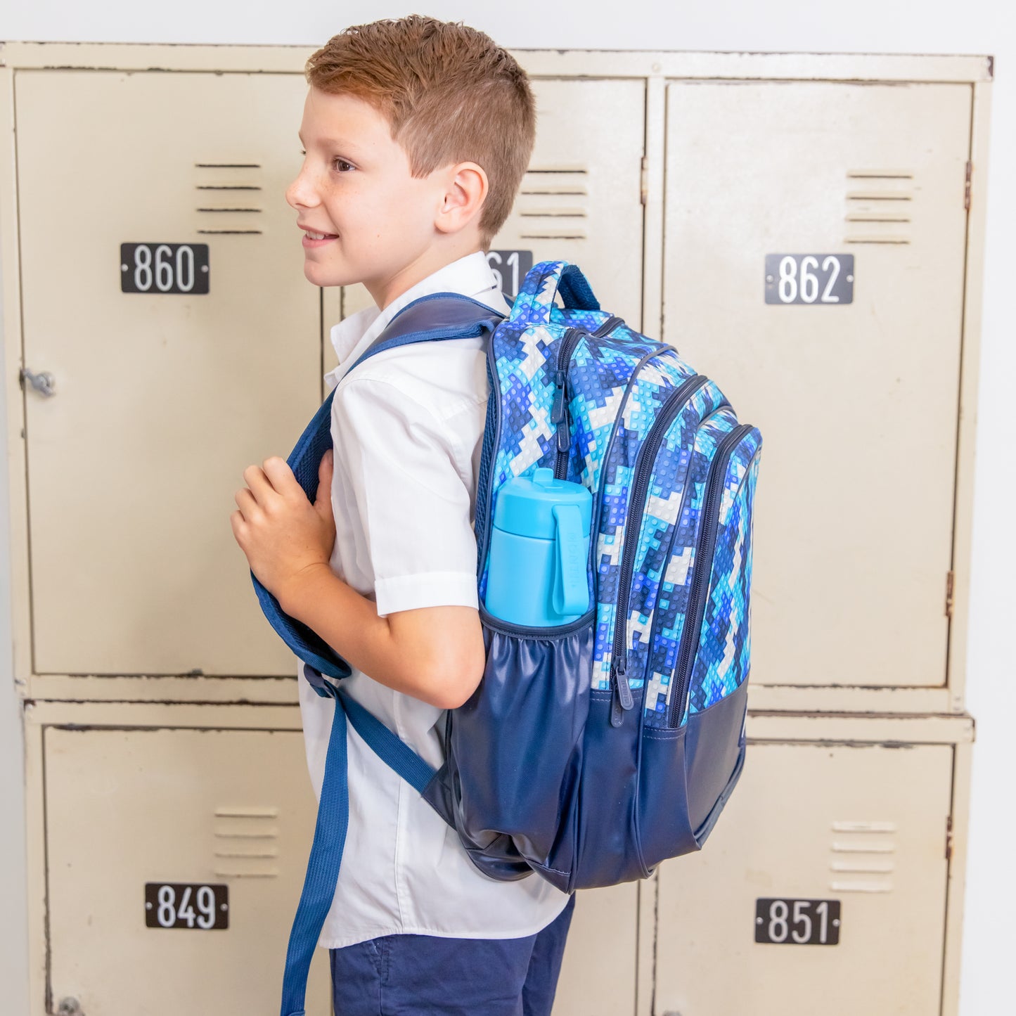 Montii.Co Backpack - Block Land