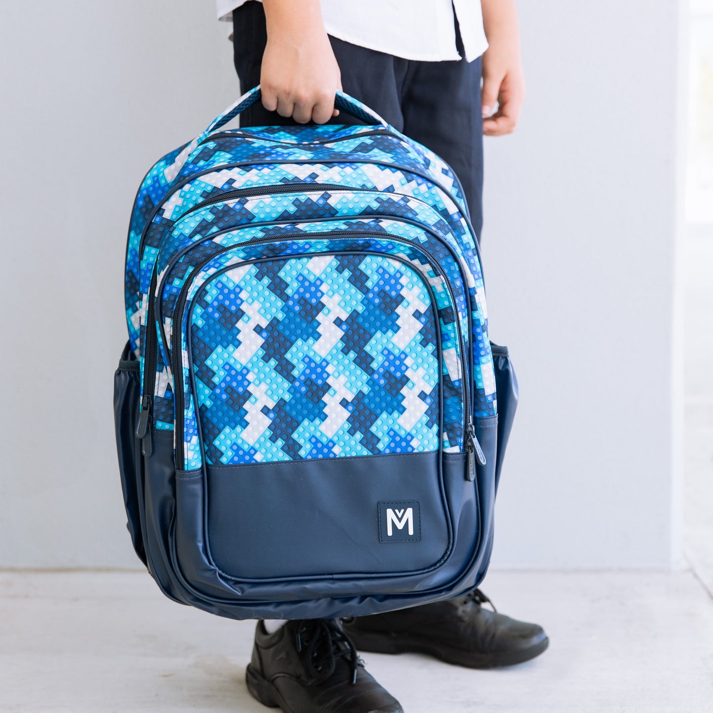 Montii.Co Backpack - Block Land