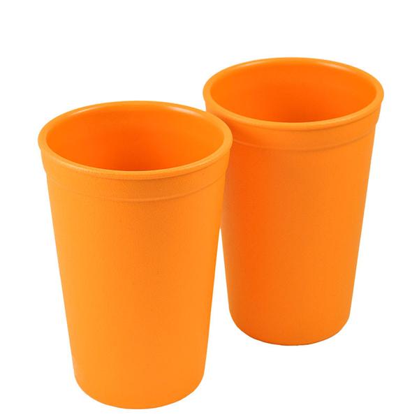 a picture of Re-Play Tumbler - Orangeon a white background for spill free drinks