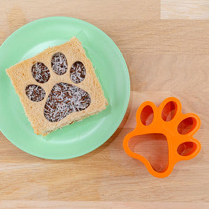 Kids lunchbox with lion‑shaped sandwiches and themed snacks made using the Lunch Punch Lion cutters