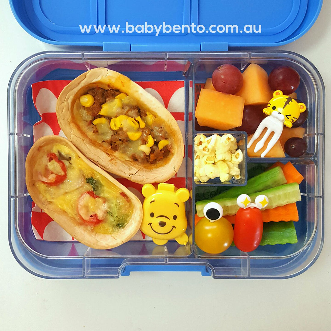 <span>Taco boat quiche, bolognaise boat, veggie sticks with miso &amp; mayo dip            </span>(in winnie the pooh container), cherry tomatoes, rock melon, grapes and popcorn in Munchbox