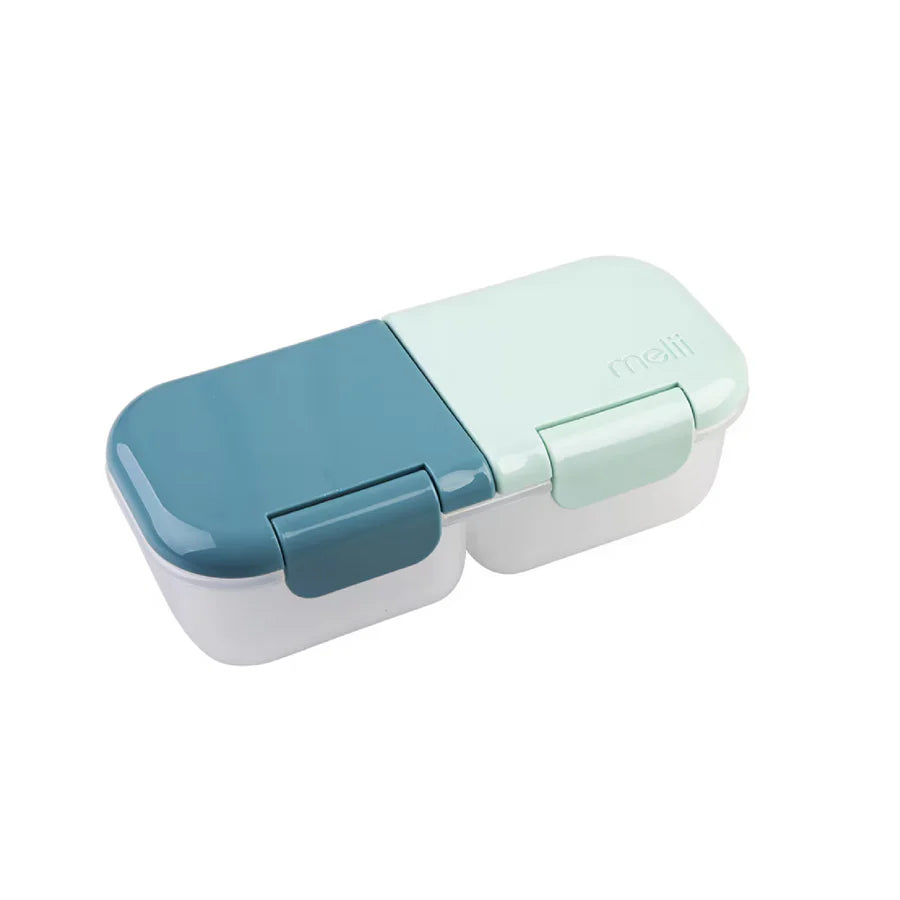 Two-tone blue and green food container on a white background