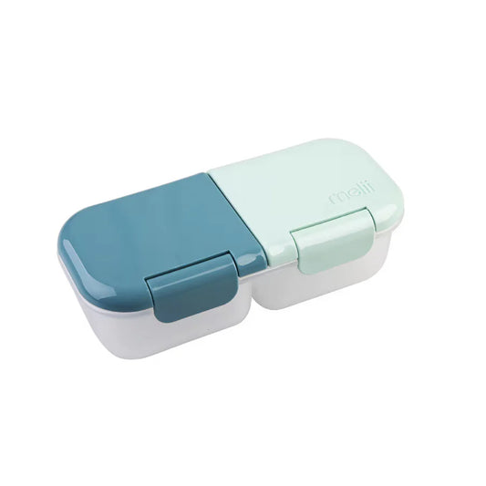 Two-tone blue and green food container on a white background