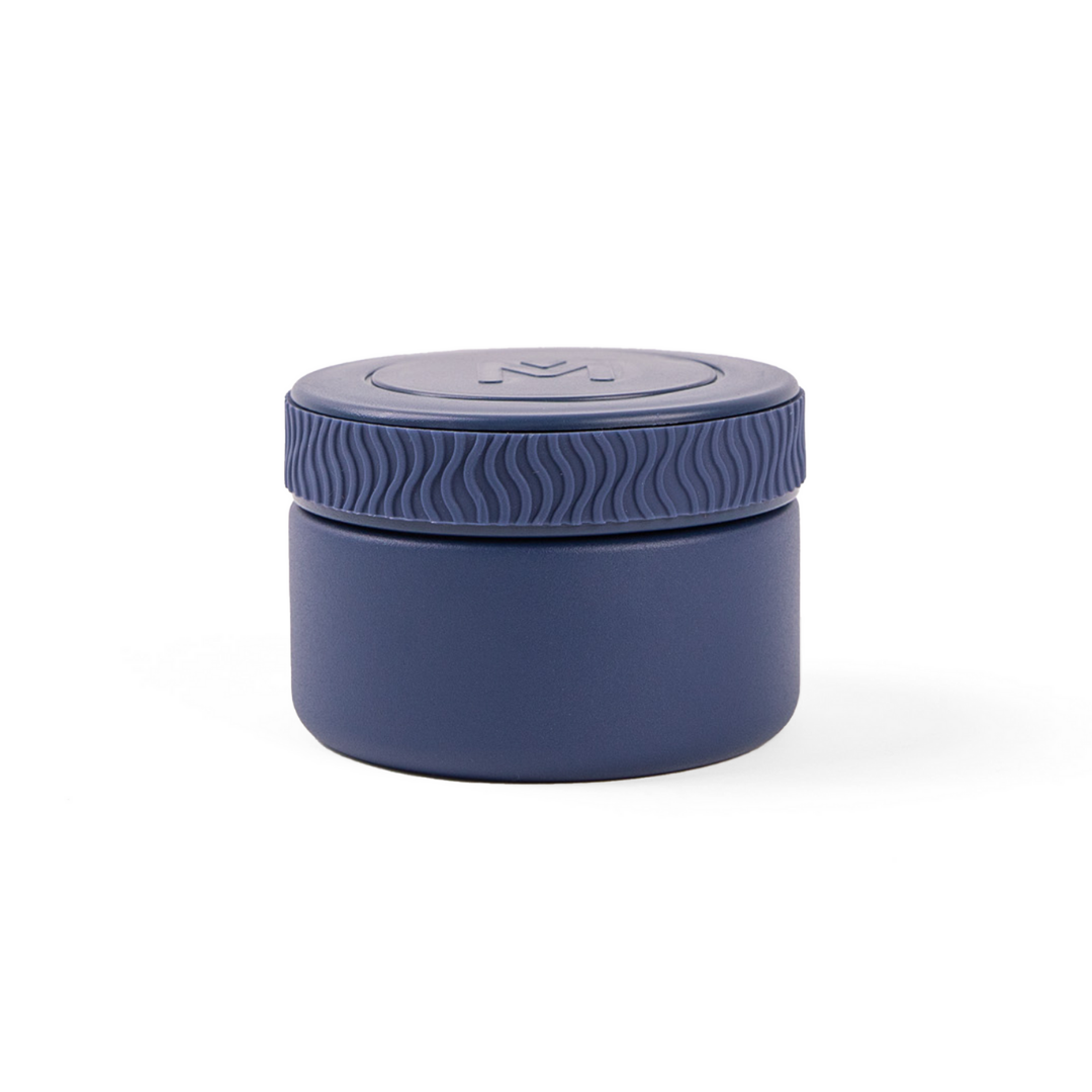 Navy Mini MontiiCo insulated food jar with stainless steel body and removable silicone seal.