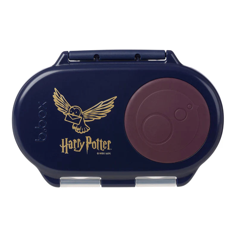 Harry Potter b.box snack box with whole‑fruit holder and leak‑proof silicone seals for small portions.