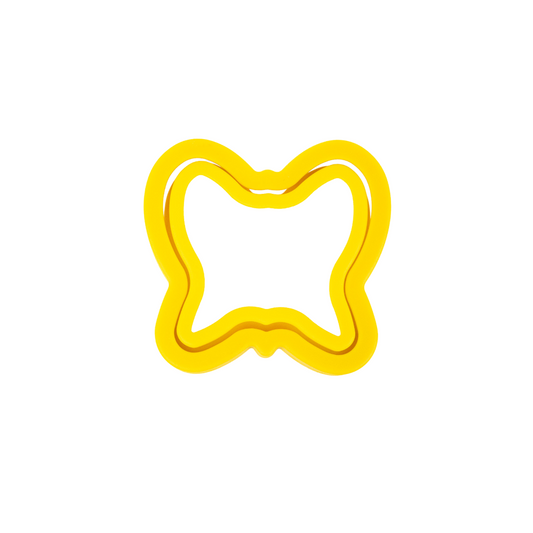 A yellow plastic sandwich cutter and crimping tool designed to create butterfly-shaped pockets.