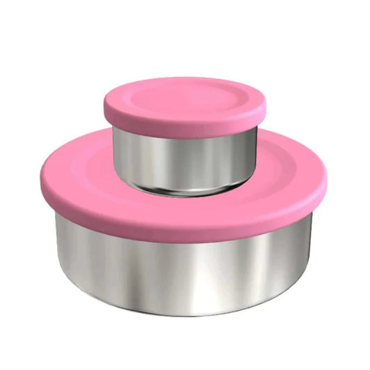 A stainless steel snack pot from ecococcoon with a pink lid, designed to fit inside a bento box.