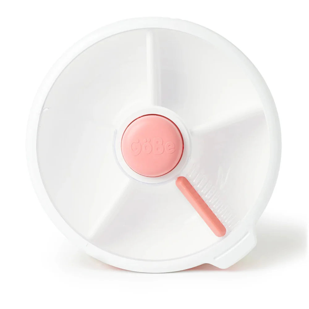 A white and coral pink Gobe Large Snack Spinner, designed for easy snack selection with a press of a button.