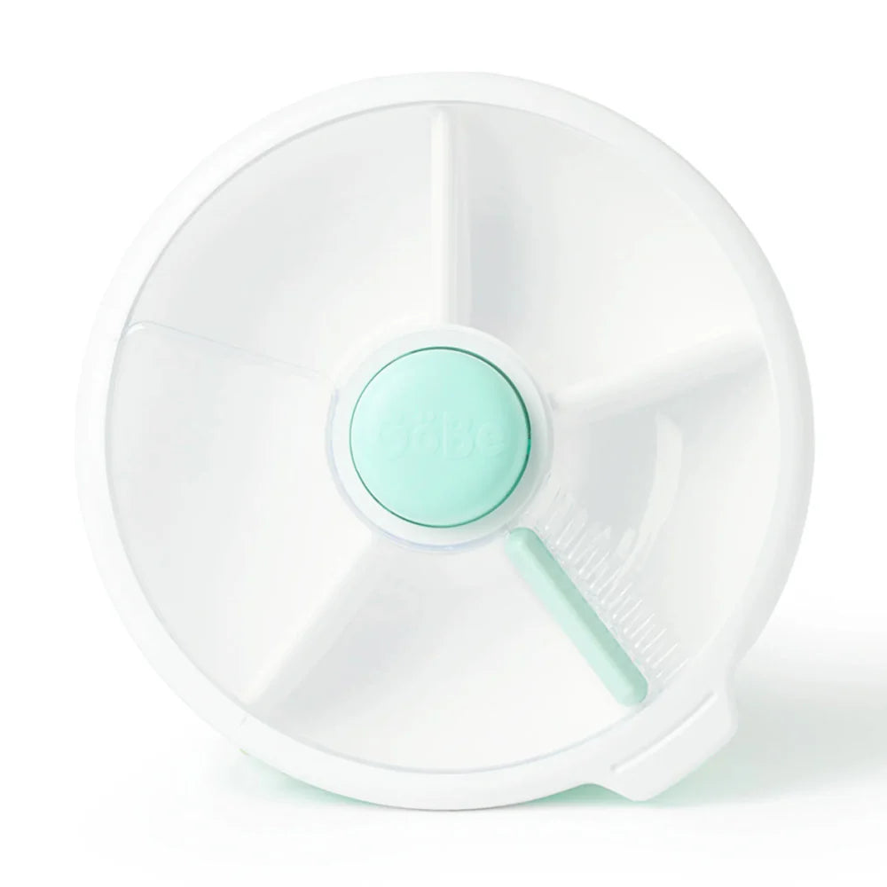 A white and blue snack spinner with multiple compartments, the central hub is blue, and it is designed for organizing snacks.