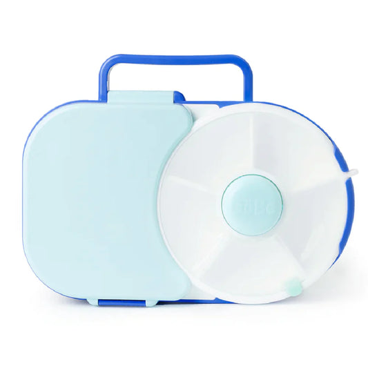 A blue and white GoBe Lunchbox with a spill-resistant snack spinner compartment.