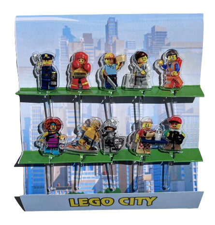 A display of acrylic food picks with LEGO City characters-themed toppings.