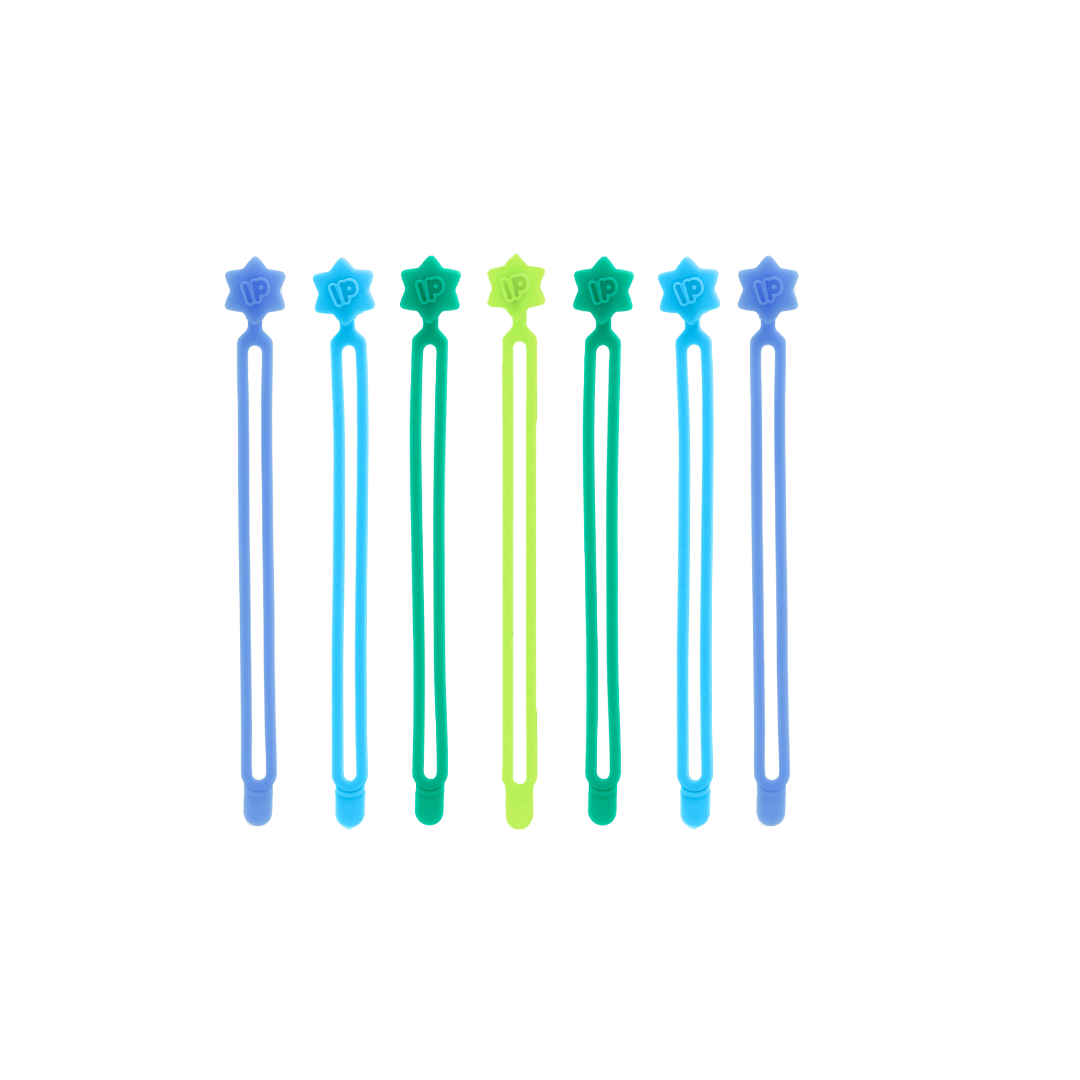 Set of blue, green, and purple hair clips with star-shaped ends on a white background