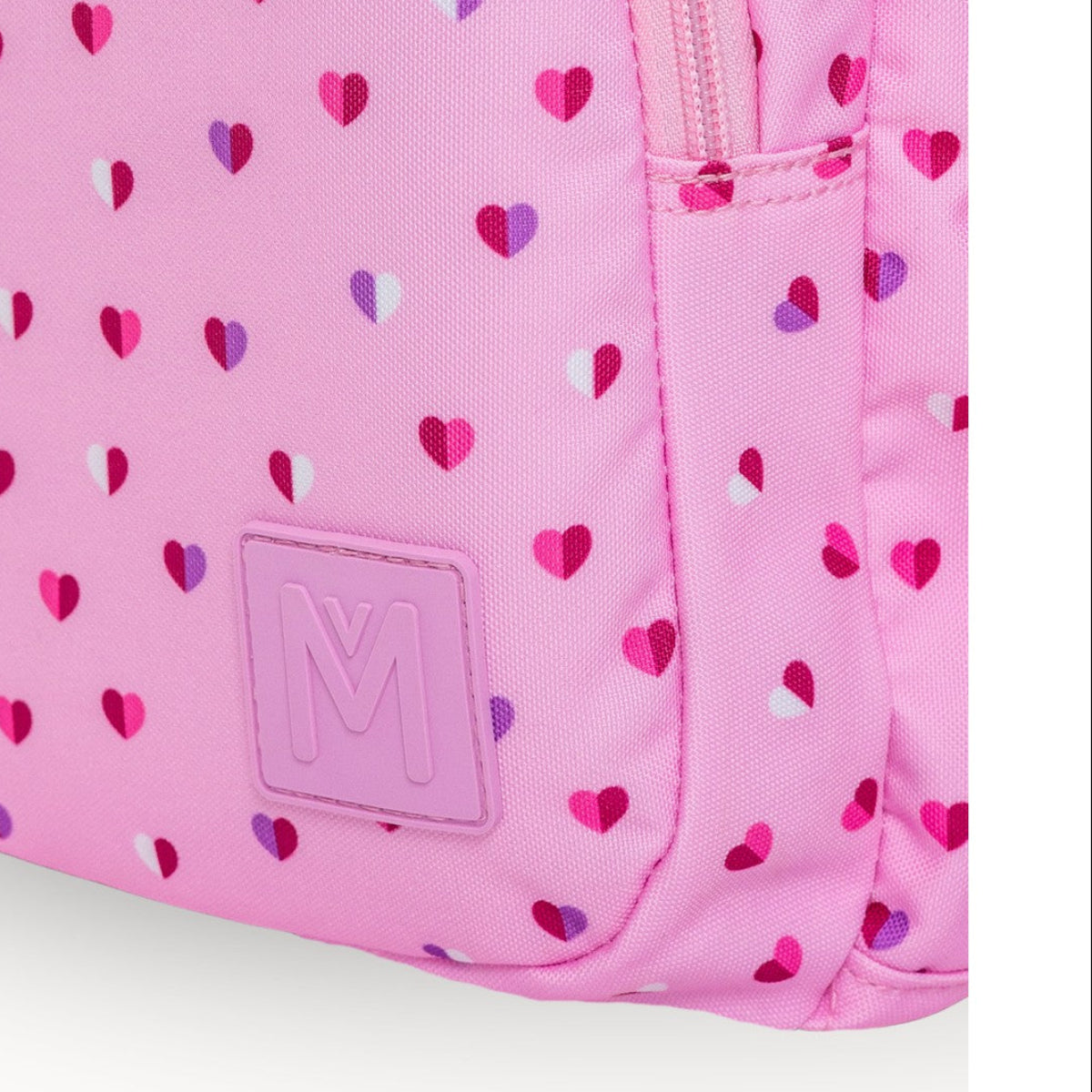 backpack with heart pattern and a visible Monti Co brand logo on a white background