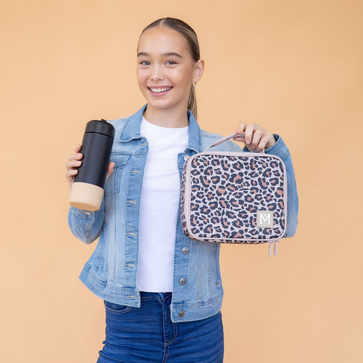 MontiiCo Medium Insulated Lunch Bag in Safari print, durable and water‑resistant kids lunch bag designed to keep food fresh for school
