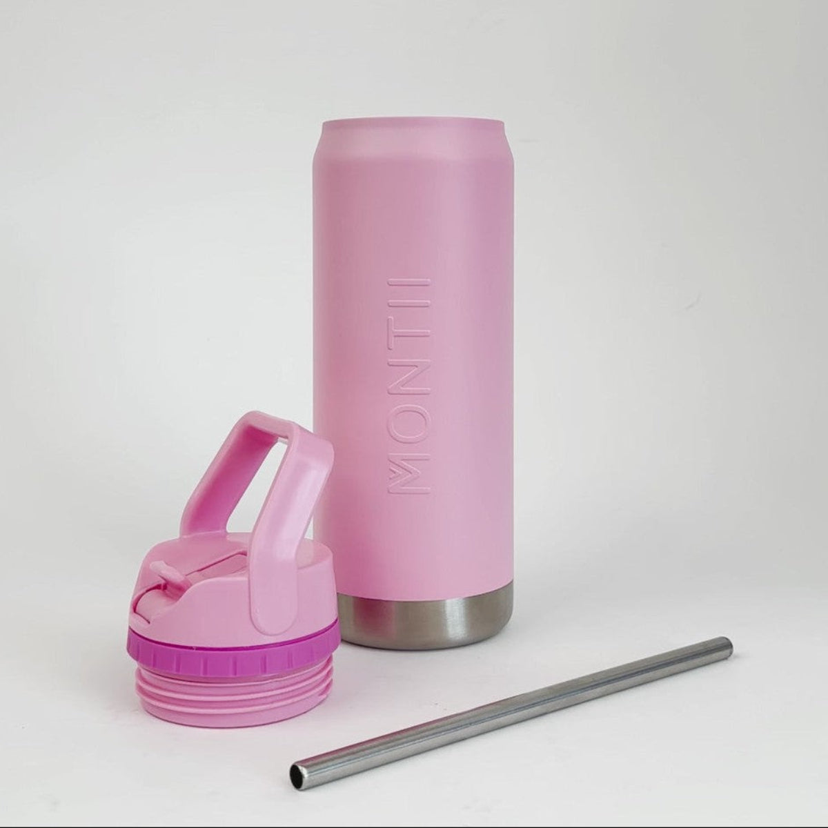 Pink Monti Co stainless steel water bottle with lid and straw on a white background