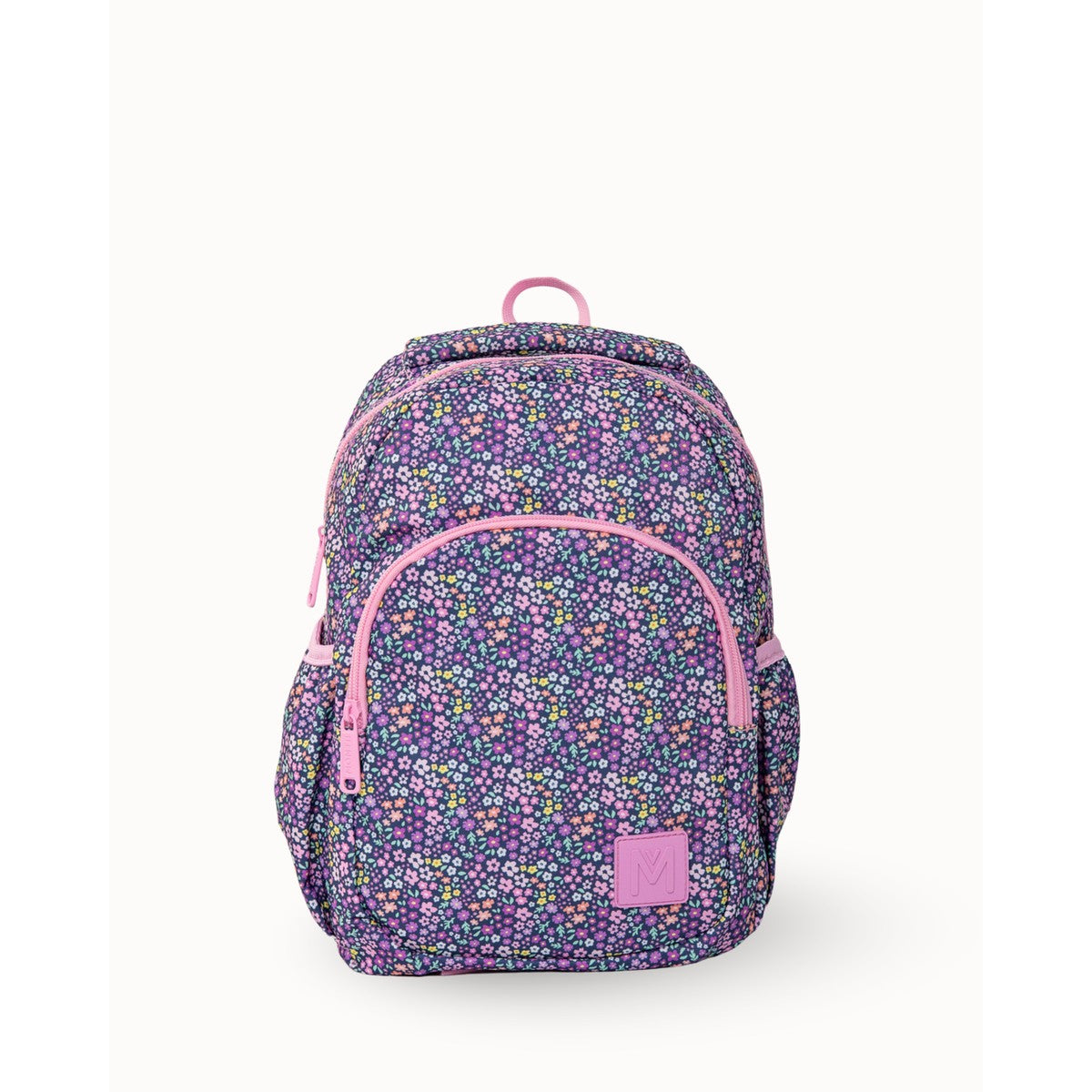 MontiiCo Mini Backpack - Meadow Floral-patterned backpack with pink accents on a white background
