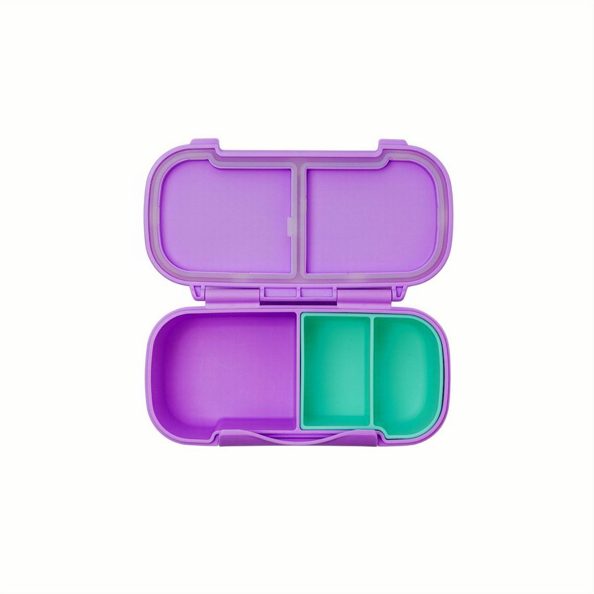 Purple MontiiCo snack container with a green snack tray compartment on a white background