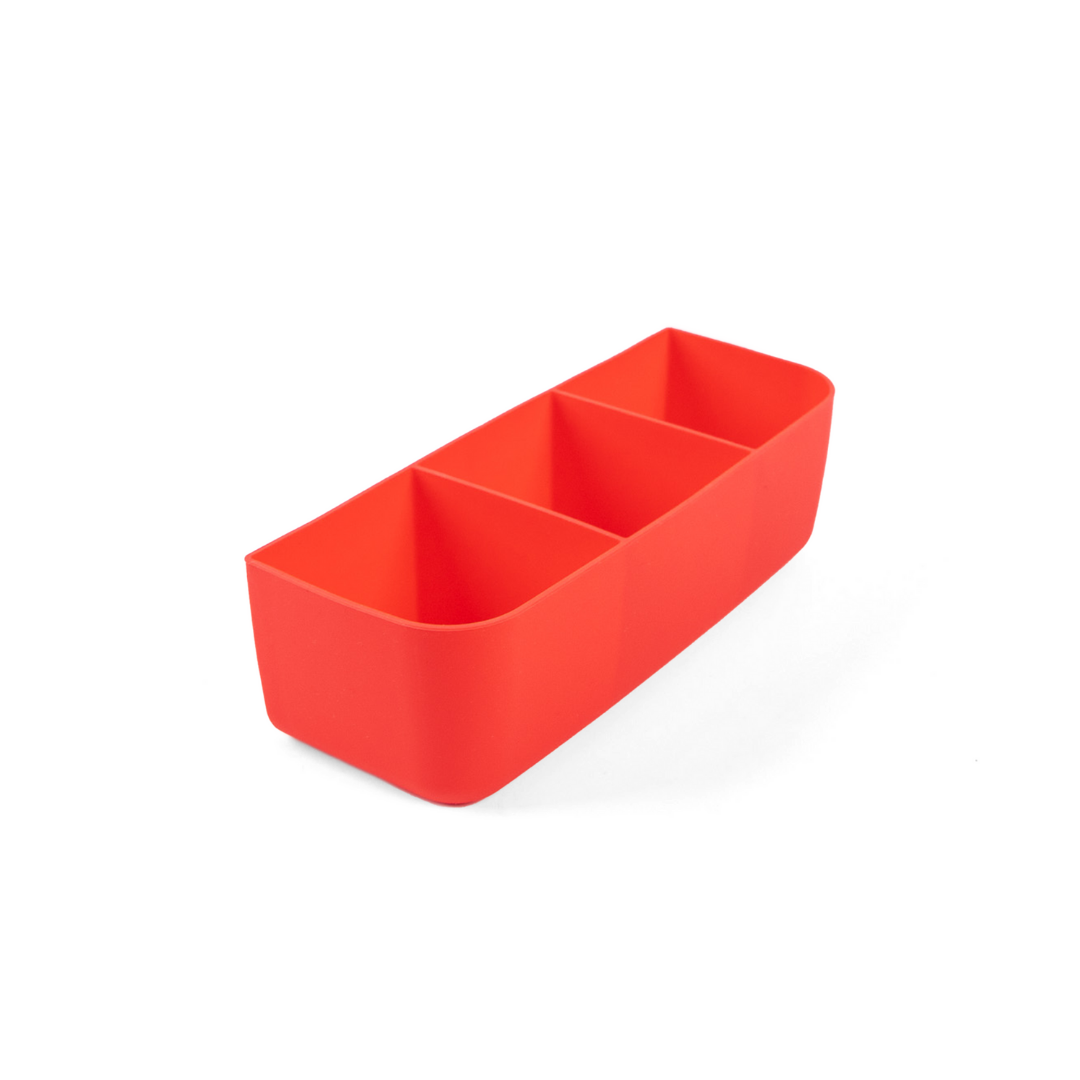 A red silicone bento tray with three compartments, designed to fit into a lunch box.