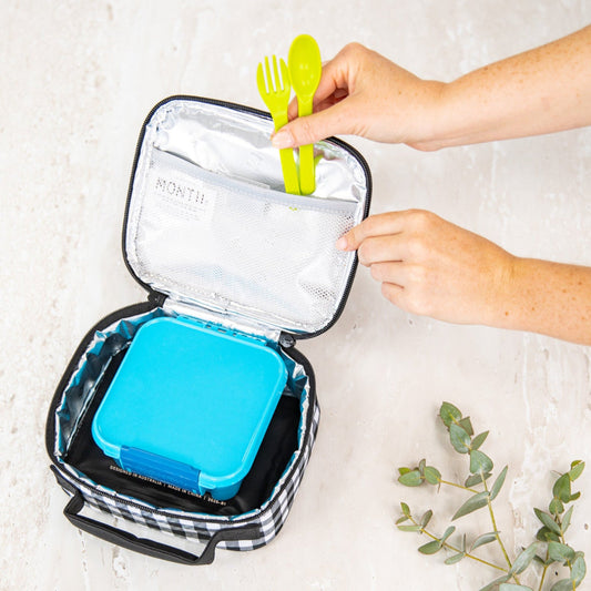 montiico mini gingham lunch bag opened to show insulated interior with a blue snack container inside