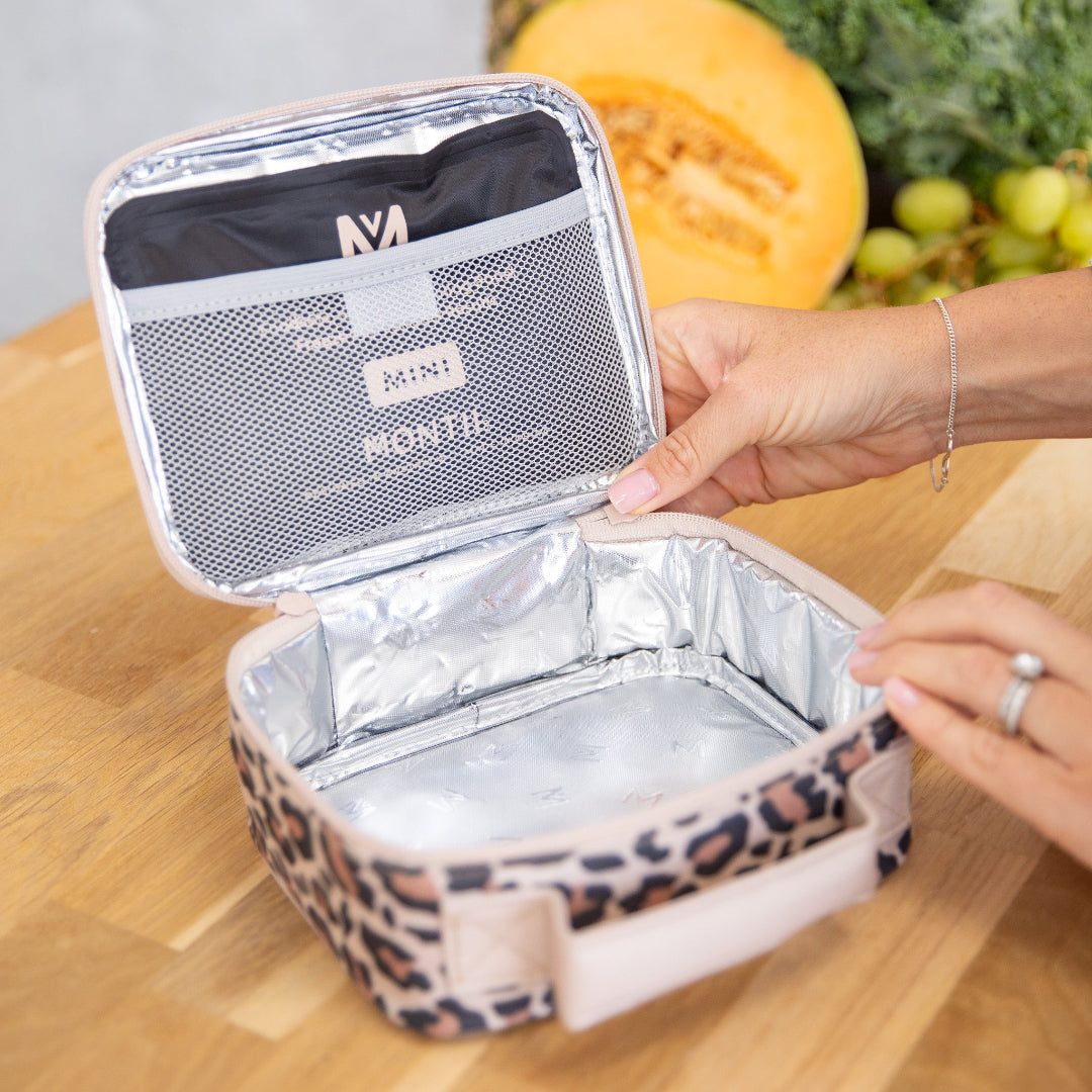 montiico mini safari lunch bag opened to show insulated interior and compact storage space