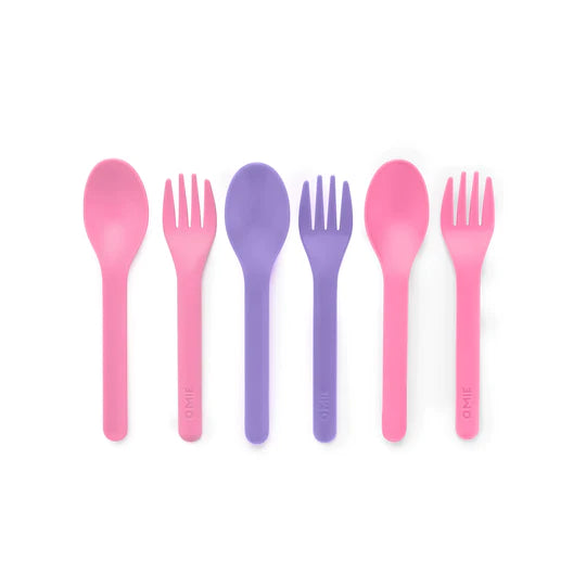Pink Omie fork and spoon set designed for little hands, nesting neatly for compact storage.