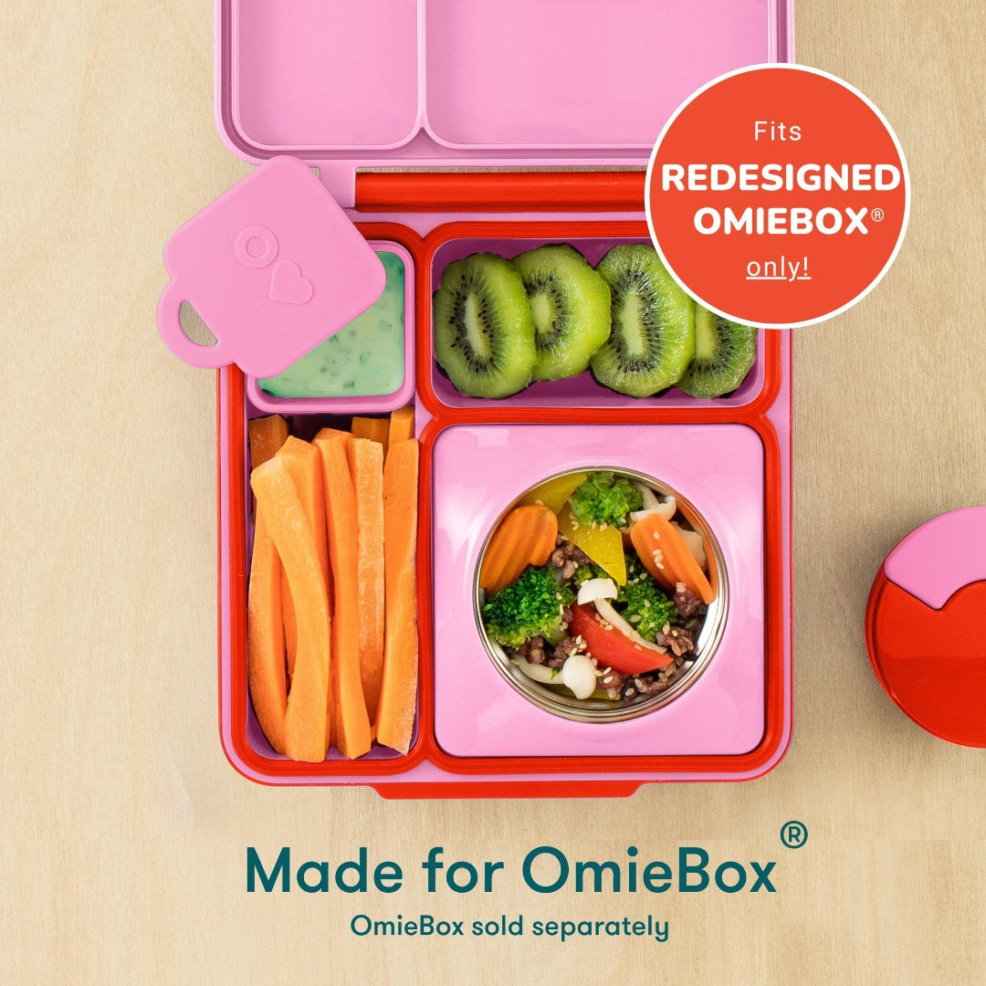 yellow and red omie dip containers placed inside omiebox v2 lunch box, baby bento