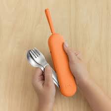 Sunshine OmieBox Up cutlery pod held in hand showing compact bento cutlery design.