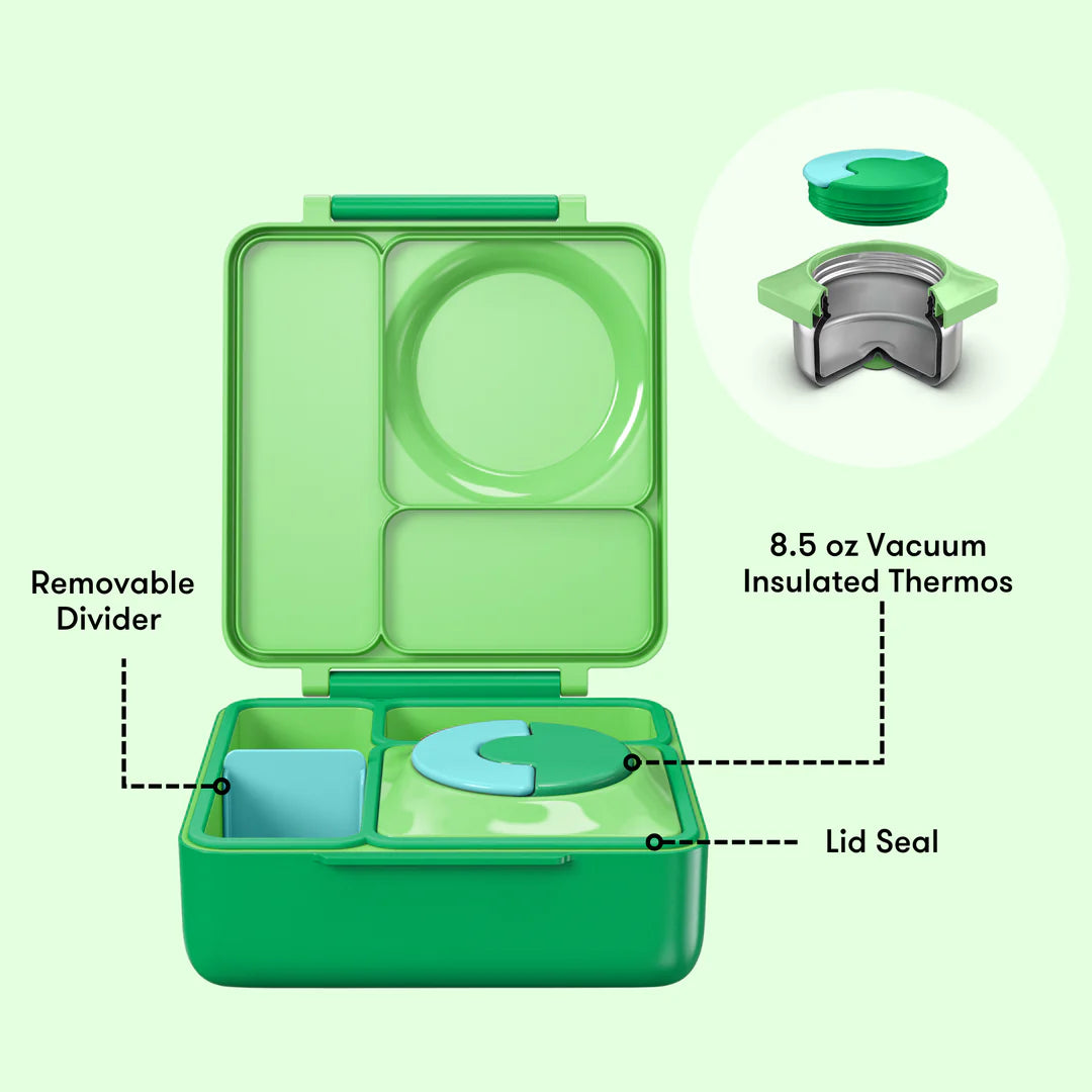 Green lunch box with removable divider, 8.5 oz vacuum insulated thermos, and lid seal on a light green background.