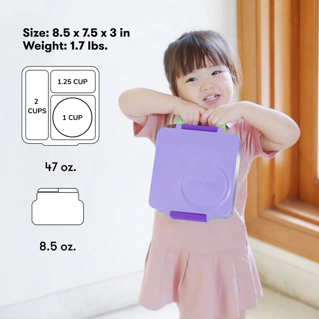 Child carrying the Lilac Purple OmieBox V2 leakproof bento lunch box, popular in Australia.