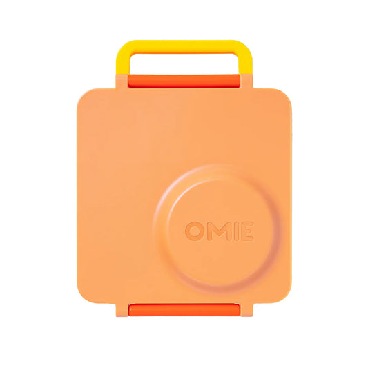 Poppy Orange OmieBox V2 leakproof bento lunch box shown closed with carry handle.