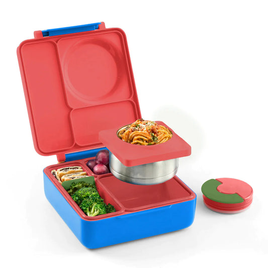 Scooter Red OmieBox V2 leakproof bento lunch box  insulated bento box with separate compartments for hot and cold food, displayed in red and blue colors with various food items arranged inside.