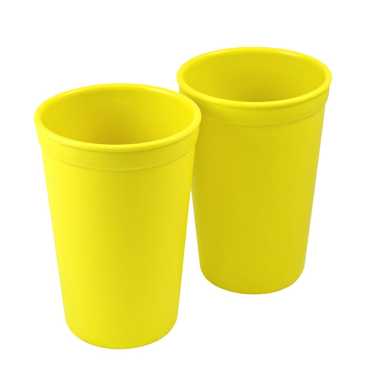 a picture of Re-Play Tumbler - Yellowon a white background for making mealtime fun and playful