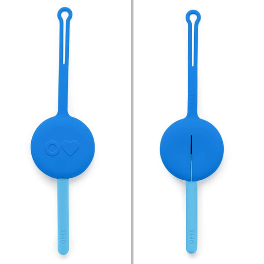Blue Omie cutlery pod with nesting fork and spoon in a portable silicone travel case.