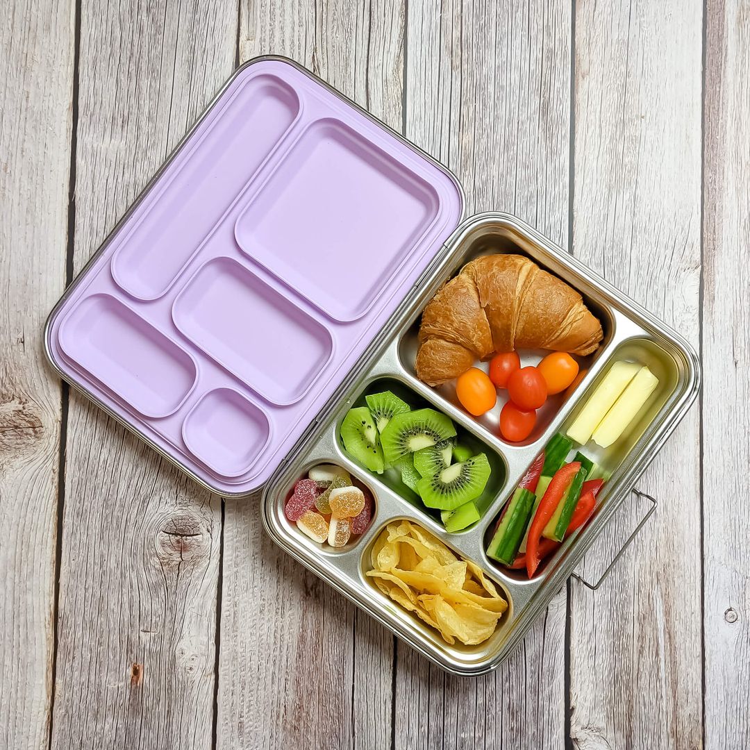 Ecococoon stainless steel leakproof bento box with five compartments and purple lid, shown filled with food to highlight its durable metal lunch box design.