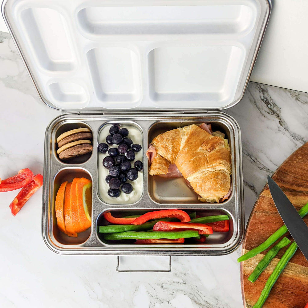 Ecococoon stainless steel leakproof bento box with five compartments and polished metal finish, shown filled with food to highlight its durable reusable lunch box design.