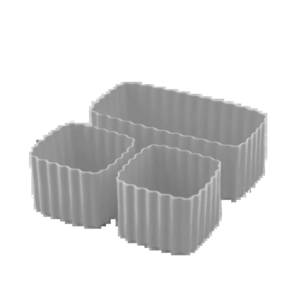 A set of grey bento cups in varying sizes, with rectangular and square shapes, in a solid chrome color.