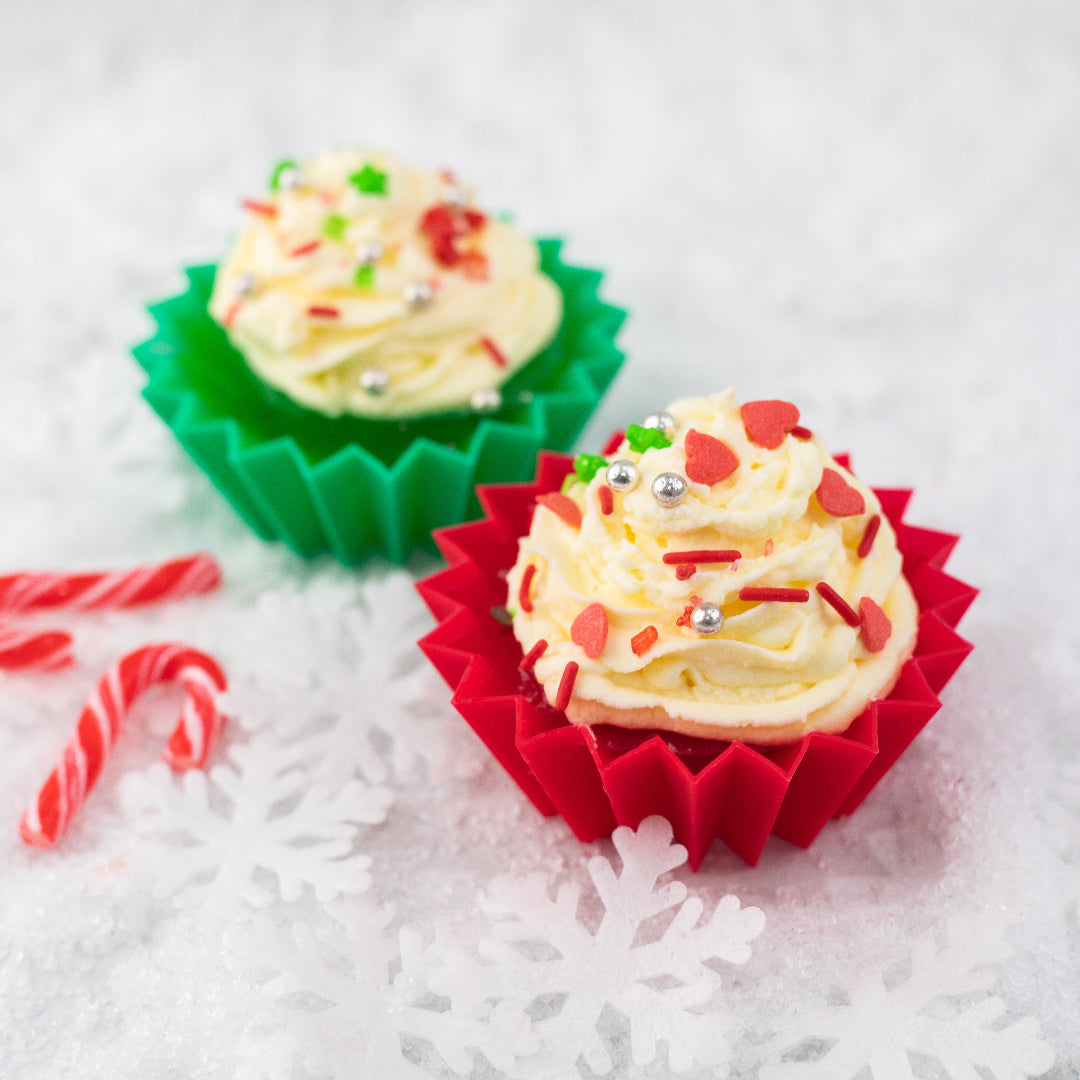 Festive cupcakes and snacks decorated with Christmas shapes using the Lunch Punch Christmas set
