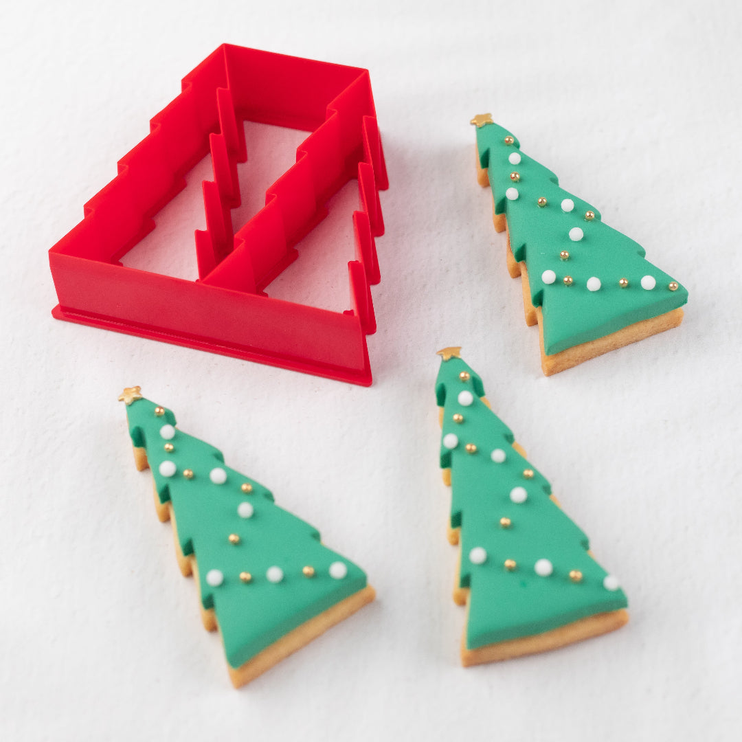 Christmas Tree‑themed sandwiches shaped like Santa and Christmas trees made using the Lunch Punch Christmas cutters
