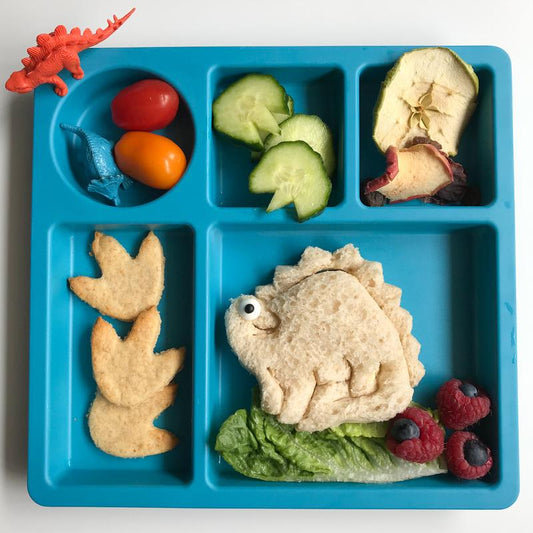 Dinosaur‑shaped sandwiches made using the Lunch Punch Dinosaur cutters