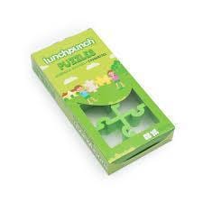 Lunch Punch Puzzles sandwich cutter packaging showing green puzzle‑piece cutters