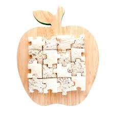 Lunch Punch Puzzles sandwich cutter set with two green interlocking puzzle‑piece cutters