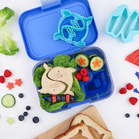 Shark‑themed sandwiches made using the Lunch Punch Sharks cutters arranged in a kids lunchbox