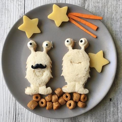Space‑themed food plate with rocket and planet sandwiches made using the Lunch Punch Space cutters