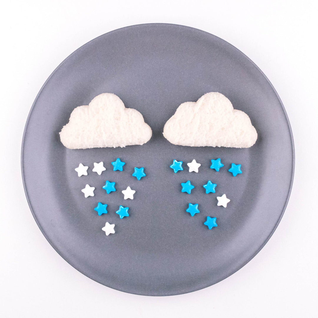 Cloud‑shaped Mini Bites pieces with blue raindrop decorations