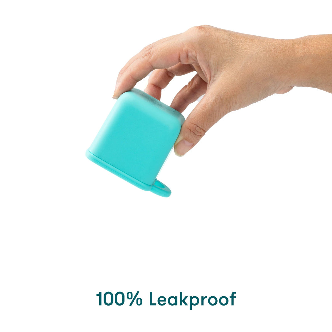 leakproof omie dip container shown sealed with liquid inside, baby bento