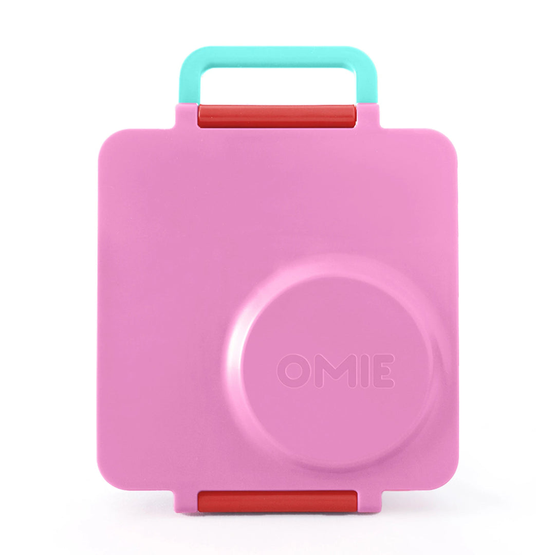 Pink Berry OmieBox V2 leakproof bento lunch box shown closed with secure latch and carry handle.